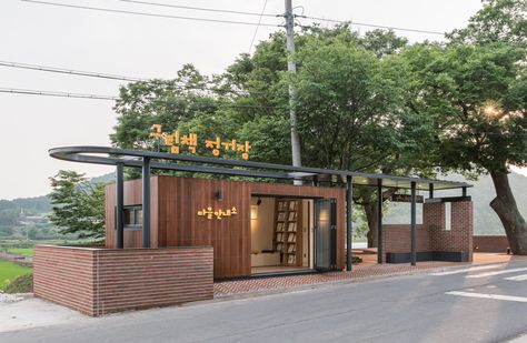 Songjeong Picture Book Village Public Facilities / studio MANI Drive Thru Design, Park Kiosk, Book Village, Public Facilities, Shelter Design, Desain Lanskap, Public Architecture, Lounge Design, Building For Kids