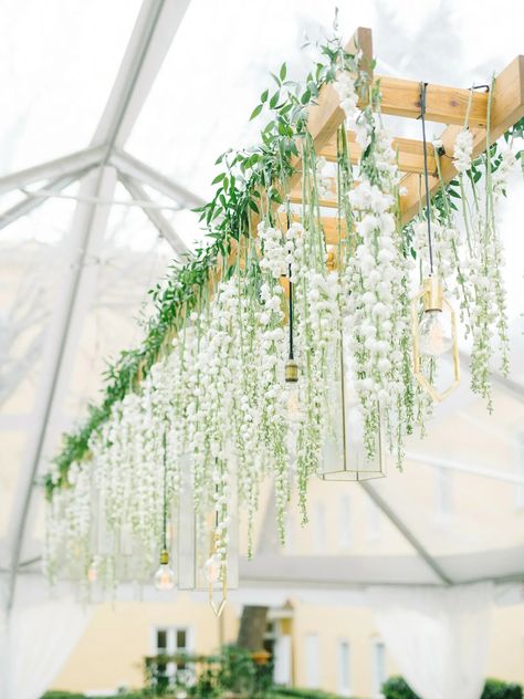 30 Hanging Wedding Flower Decorations That Are Show-Stopping Delphinium Hanging Installation, Ladder Wedding, Hanging Flowers Wedding, Wedding Ceiling Decorations, Hanging Centerpiece, Hanging Ladder, Wedding Ceiling, Diy Wedding Reception, Wedding Chandelier