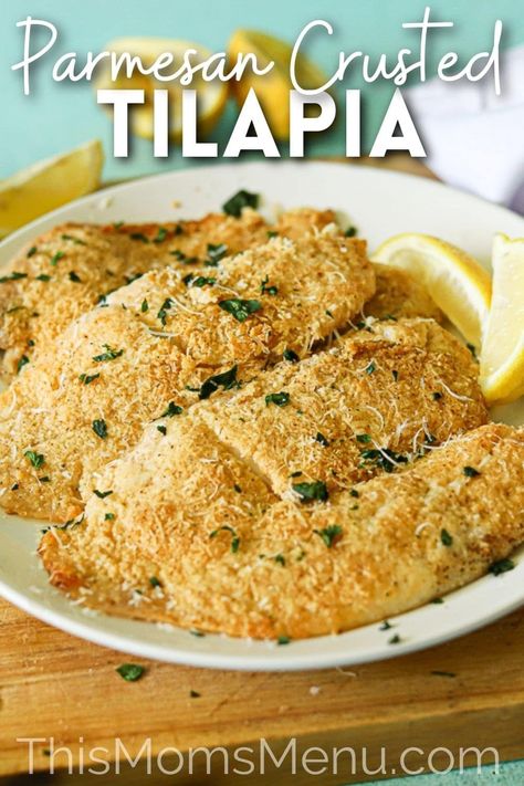 This delicious baked tilapia is ready in just 20 minutes, making it perfect for busy nights! With a delicious crust of parmesan cheese, garlic, lemon, and just a touch of spice this low-carb recipe will satisfy the entire family! Tilapia Dinner, Tilapia Recipes Easy, Baked Tilapia Recipes, Parmesan Crusted Tilapia, Crusted Tilapia, Baked Tilapia, Touch Of Spice, Budget Friendly Dinner, Green Meals