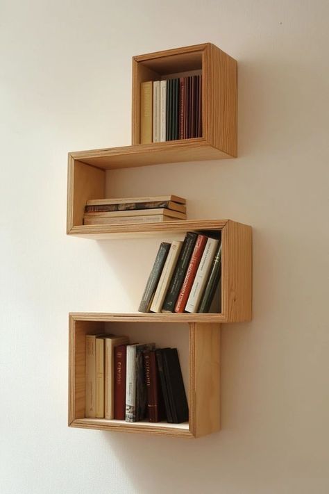 "Transform your space with sleek Floating Bookshelves! 📚🛠️ Ideal for creating storage in compact rooms. 🌿✨ #BookshelfInspo #SmallSpaceDecor #DIYHome" Wooden Book Shelves On Wall, Wooden Floating Bookshelves, Small Bookshelf On Wall, Bookshelves Small Space, Small Wall Bookshelf Ideas, Diy Bookshelf Wall Small Spaces, Wall Bookshelf Ideas Bedroom, Wall Shelves For Books, Floating Shelves For Books