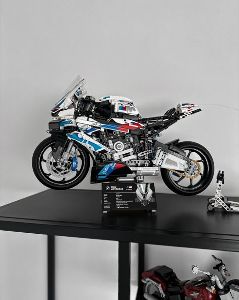 Revved up and ready to roll! 🏍️🔥 From building blocks to this BMW M 1000 RR brilliance. Check out this Lego masterpiece and dive into my roaring car collection at the second photo! #LegoMasterpiece #legobmw #CarCollectionGoals Lego Bmw M1000rr, Lego Motorcycle, Car Lego, Lego Room Decor, Lego Collection, Lego Room, Bmw S1000rr, Lego Cars, Bespoke Fashion