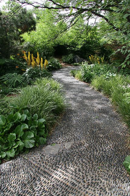 You will need a lot of stones and some knee pads but,this path is AWESOME!!! Pebble Patio, Pebble Path, Pebble Garden, Walkways Paths, Gravel Path, Path Design, Garden Walkway, Cement Planters, Stone Path