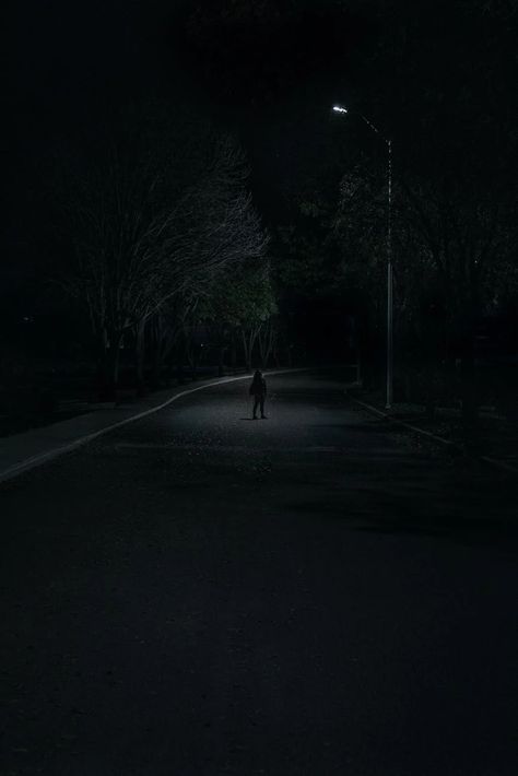 Photo of Person Standing on Street · Free Stock Photo Person Standing Under Streetlight, Creepy Pictures, Inspo Board, Street Lamp, Person Standing, Street Light, Night Photography, Free Stock Photos, Street Photography