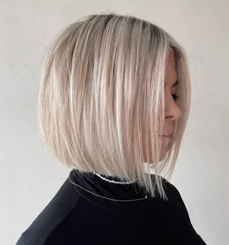 Angled Wispy Beige Blonde Bob Beige Blonde Bob, Wide Cheekbones, Blonde Angled Bob, Bob Haircut Ideas, Angled Bob Hairstyles, Trendy Bob Hairstyles, Silver Blonde Hair, Textured Layers, Layered Bob Haircuts