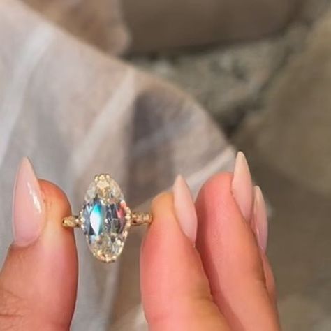 EAST WEST GEM CO. // on Instagram: "The elongated culet on this Old Mine Moval is just 🤯 It gives almost a hall of mirror effect, but on a rounded off cut that’s elongated, timeless and feminine. -————————— #EASTWESTHARLOW - 7.8 carats (1.9 ratio) - 16x8.75mm old mine moval (elongated culet), vintage white moissanite center set in a 14k yellow gold setting - Donut upgrade - $4,275 (as shown) 🤚🏻 Shown on a size 4.5 finger 💍 This exact ring is available for try on in the Miami showroom or can Moval Engagement Ring, East West Gem Co, Crystal Jewelry Necklaces, 5 Fingers, Hall Of Mirrors, Future Engagement Rings, Mirror Effect, Yellow Gold Setting, East West