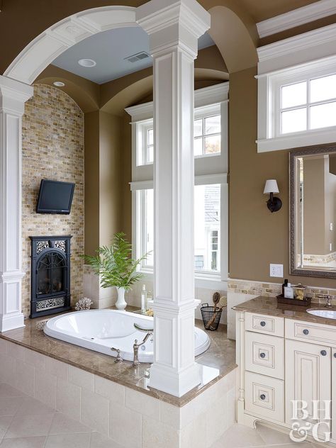 Put a fireplace in your bathroom to enjoy the sight and warmth of a roaring fire as you relax in the tub or do evening stretches. If the bathroom is attached to your bedroom, consider a double-sided fireplace for twice the enjoyment. Paired with a few other easy bathroom upgrades, a fireplace will make your master bathroom feel like an at-home spa. Evening Stretches, Small Bathroom Upgrades, Easy Bathroom Upgrades, Bedroom Upgrades, Monochromatic Room, Minimal Bathroom, Bathroom Fireplace, Bathroom Spa, Dream Bathrooms