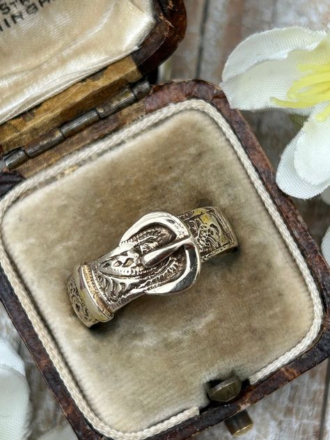 A fabulous vintage statement buckle ring crafted in 9 carat yellow gold, hallmarked in Birmingham in 1993. This lovely ornate patterned ring is large in size and suitable for either a man or woman. Buckle rings were very popular in the Victorian era and often exchanged between loved ones as token of love, loyalty and strength. A thoughtful gift idea for a loved one or even a special treat for yourself! Size - R (UK), 59 (EU), 8 3/4 (US) Weight - 4.6g Ring measures 9.5mm wide at buckle Hallmark - Belt Buckle Ring, Victorian Belt Buckle, Buckle Rings, Belt Buckle Jewelry, Gold Ring Stacking, Gold Schmuck, Belt Ring, Buckle Ring, Solid Gold Ring