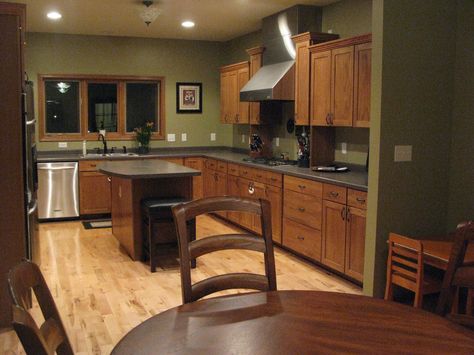 Kitchen Redo Railings Kitchen, Neutral Kitchen Paint Colors, Black Soapstone Countertops, Popular Kitchen Paint Colors, Rounded Ceiling, Brown Cupboards, Black Soapstone, Nook Kitchen, Green Kitchen Walls