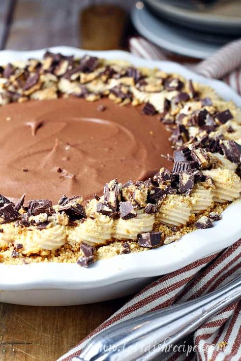 Better Than Costco Peanut Butter Chocolate Cream Pie Recipe -- A creamy peanut butter layer is topped with a light and fluffy chocolate mousse layer in this rich and decadent Costco copycat recipe. #pie #costco #dessert #peanutbutter Peanut Butter Crunch Cake Recipe, Copycat Costco Chocolate Peanut Butter Pie, Costco Peanut Butter Chocolate Cream Pie, Costco Peanut Butter Chocolate Pie, Chocolate Peanut Butter Cream Pie, Chocolate Dessert For Thanksgiving, Reese’s Pie, Costco Peanut Butter Pie, Costco Copycat Recipes