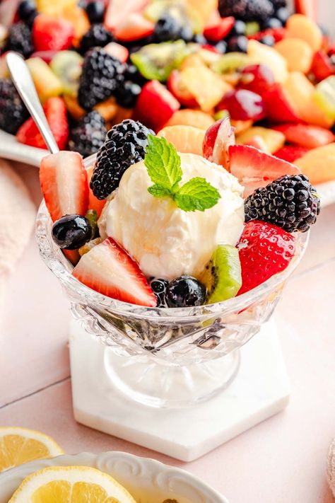 This homemade fruit salad with ice cream is a beloved family recipe. With a secret ingredient that makes it unlike any other, this recipe is a must-have summer treat! Fruit Salad Ice Cream, Fruit Salad With Ice Cream, Ice Cream With Fruit, Homemade Fruit Salad, Froyo Recipe, Fruit Ice Cream, Types Of Desserts, Fruit Toppings, Summer Tea