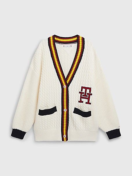 Girl's Kids' TH Monogram Varsity Cardigan  Ancient White  - Tommy Hilfiger girls' sweater. Inspired by our heritage  but designed for tomorrow—our TH Monogram is a modern take on a time-honored icon.60% organic cotton  40% acrylic.Imported. • Machine washable. Monogram Vest, Tommy Hilfiger Shop, Varsity Cardigan, Tommy Hilfiger Store, Tommy Hilfiger Kids, Tommy Hilfiger Girl, Rib Knit Cardigan, Baggy Clothes, Streetwear Fashion Women