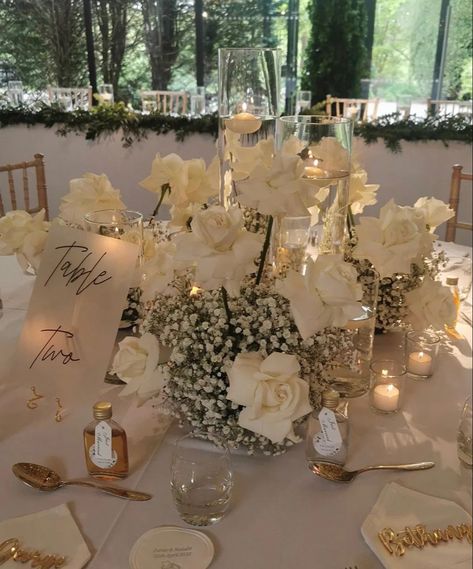 Ivory And Greenery Wedding, Baby's Breath And White Roses Wedding, White Floral Centerpieces Round Table, Diy White Centerpieces, Castle Wedding Bouquet, Timeless Wedding Altar, Big Floral Centerpieces, How To Decorate A White Wedding Tent, Wedding Square Table Decorations