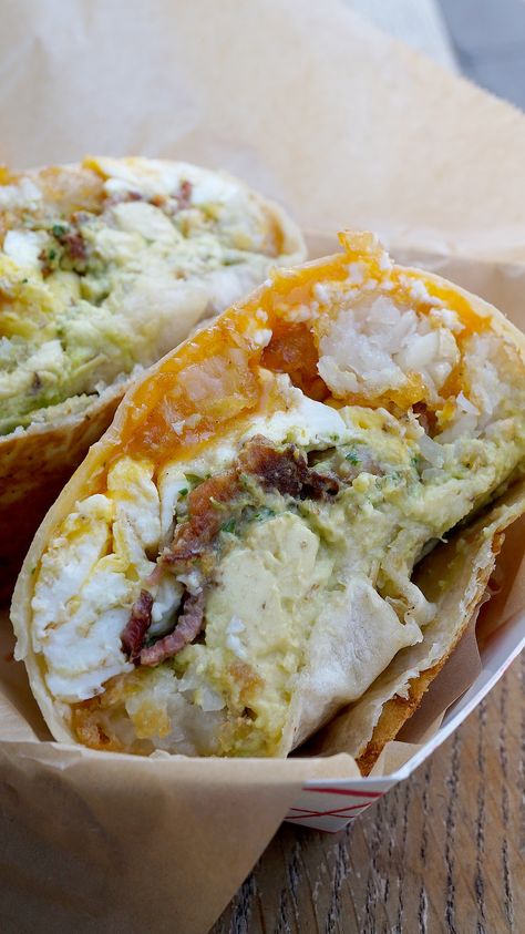 This breakfast burrito from The Rooster is called the Rico Suave and it's so delicious!  To see why I love it so much go to FollowMyGut.com! #FollowMyGut #foodie #foodblogger #restaurant #LA #LosAngeles #foodtruck #foodnetwork #hollywood #eater #eatinla #wheretoeat #breakfast #burrito #breakfastburrito Seattle Breakfast, Rico Suave, Spicy Ketchup, Fancy Breakfast, Gourmet Breakfast, Breakfast Burrito, Burritos Recipe, Chicken Burritos, Morning Snack