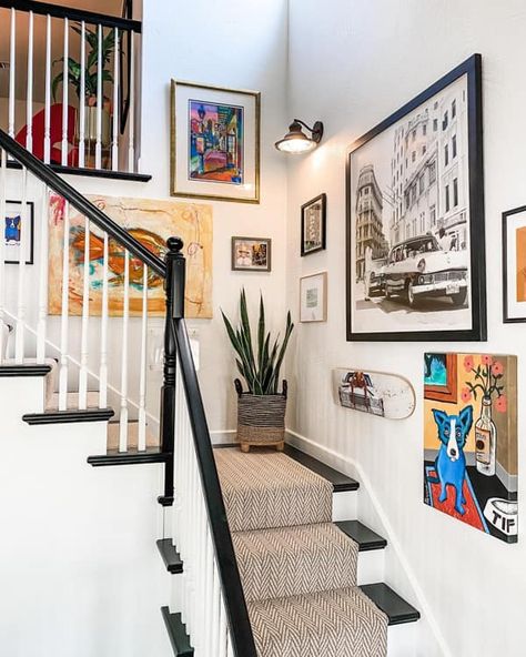 Stairwell Wall Covered with Different Size Canvas Townhome Stairway Decorating, Fun Stairwell Ideas, Creative Stairway Ideas, Art For Staircase Wall, Decorating Up The Stairs Wall, Basement Stairway Decorating Ideas, High Staircase Wall Decor, Artwork Up Staircase, Stairwell Corner Decor