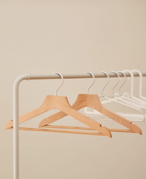 MUJI line-up of hangers.| Hangers are the secret to a neatly organized closet. Whether hanging laundry, lining up clothes in the closet, or putting items away for the season, choose the right hanger for the job. | Beech Wood Slim Hanger and Aluminium Laundry Hanger Hanger Aesthetic, Laundry Aesthetic, Clothes In The Closet, Bags Hanger, Diy Dressing, Hanging Laundry, Laundry Hanger, Swap Party, Organized Closet