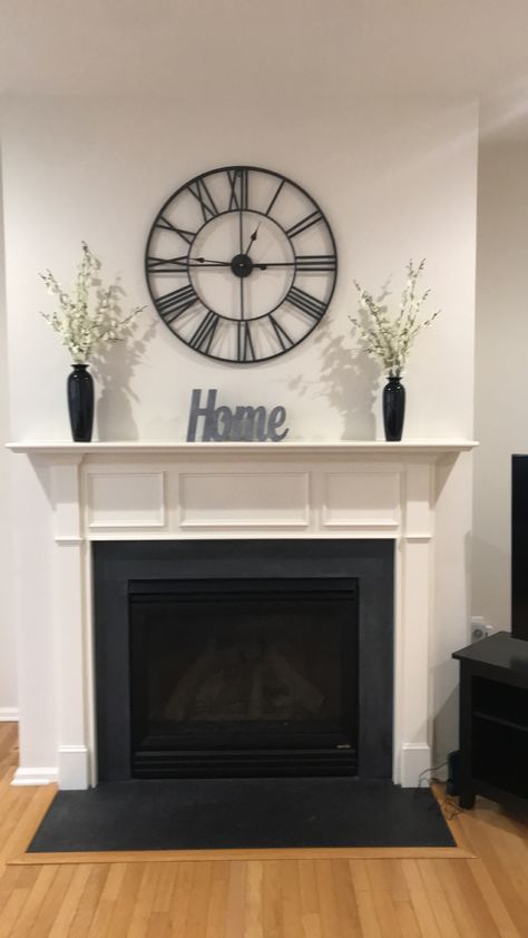 Chimney Wall Decor Ideas, Fireplace With Clock Above, Above Fireplace Decor Modern, Artificial Fireplace Living Rooms, Clock Mantle Decor, Mantel Decorating Ideas With Clock, Modern Fireplace Decor Ideas, Clock Fireplace Decor, Fire Places Decoration Ideas