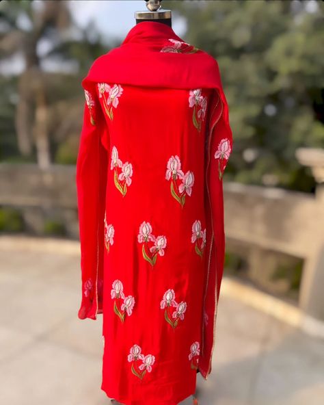 "Artistry meets elegance" : Iris blooms delicately hand-painted on a crimson canvas. Iris florals handpainted on a red crepe suit with taby silk dupatta. Florals are enhanced with hand embroidery all over kurta and dupatta. Shop now @inaayatbyaastha DM or comment for more queries. #inaayatbyaastha #handpaintedsuits #crimsonred #handpainteddupatta #handpaintedsuitsanddupattas #fashionlovers #trousseaushopping #giftideas #punjabisuits #tabysilk #tabysilkduppatta #crepesuit #floralsuit #flor... Kurta And Dupatta, Silk Dupatta, Punjabi Suits, Hand Embroidery, Shop Now, Hand Painted, Embroidery, Silk, Canvas