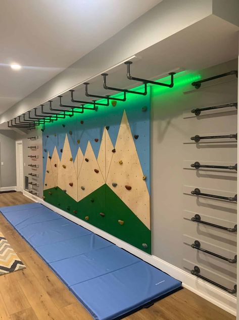 Schmidtfer Homes Indoor Monkey Bars Indoor Monkey Bars, Indoor Climbing Wall, Indoor Playroom, Basement Gym, Basement Playroom, Homemade Hamburger, Gym Room At Home, Indoor Gym, Kids Basement