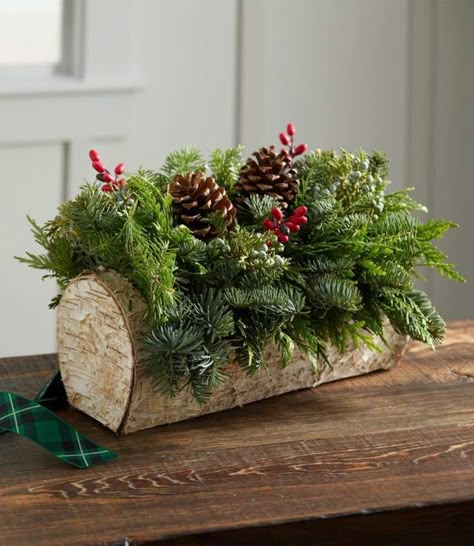 Christmas Yule Log Centerpiece. Add this beautiful centerpiece to your Christmas table. #holiday #christmas #ad Art Floral Noel, Log Centerpieces, Christmas Yule Log, Winter Chalet, Christmas Garden Decorations, Christmas Log, Centerpiece Christmas, Christmas Table Centerpieces, Wooden Log