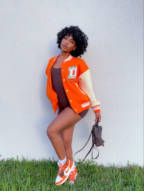 Air Jordan 1 Taxi Outfit Women, Outfits With Orange Jordan 1s, Orange Fall Outfit Ideas, Orange And Brown Jordan 1 Outfit, Orange Jordans Outfit For Women, Orange 1s Outfit, Blue And Orange Outfit Black Women, Orange Jordan 1 Outfit Women, Brown And Orange Outfits For Black Women