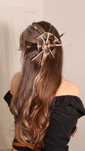 Maureen - Hairstyle on Instagram: "New hairstyle with swords ✨⚔️✨I was inspired by a rudder ! Do you like the result ? 🖤 #maureen #hairstyle #sword #badasshair #updohairstyles" Witch Aesthetic Hair, Pirate Inspired Hairstyles, Wedding Swords, Pirate Hairstyles, Fantasy Hairstyle, Starfall Ball, Fantasy Hairstyles, Pirate Hair, Medieval Hairstyles