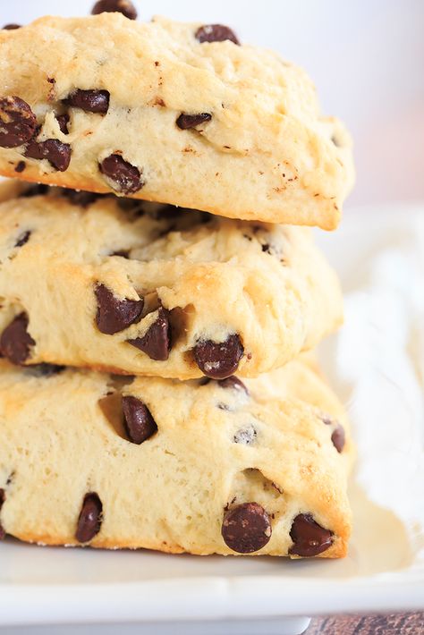 Chocolate Chip Scones - wonderfully tender and perfect alongside a cup of coffee for breakfast or dessert! | http://www.browneyedbaker.com/chocolatey-morning-goodness/ Chocolate Chip Scones, Scones Recipe, Breakfast Pastries, Crumpets, Quick Breads, Scone Recipe, Perfect Breakfast, A Cup Of Coffee, Afternoon Snacks