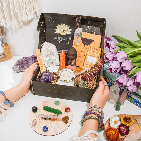 Want to Make 2024 a Peaceful Year? Then you’ll love our gift for you! 🎁 Transform your mental health with the Mindful Box - a monthly self-care ritual! Subscribe and receive: 💎 100% Natural Crystals to harmonize your energy 📿 Gemstone Jewelry to remind you of your inner strength 🧘 Mindful Amulets & Decor to create your serene space Plus, get exclusive access to our Mindful+ Community and a FREE Digital Mental Health Planner to track your progress in the new year!! 🎁 Spiritual Box Ideas, Holistic Crystals As Gifts, Spiritual Gift Box Ideas, Spiritual Box Chain Necklace Gift, Witch Subscription Boxes, Witch Kit, Boho Shops, Essential Oil Remedy, Care Box