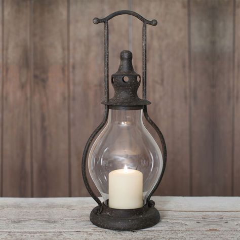 A Warm, Welcoming Glow for Visitors ✨ Lanterns not only enhance an environment but can offer a touch of elegant beauty to your home and garden! This vintage lantern candle colder will make a great focal point and impressive statement wherever it’s placed. Shop our best offers at www.thefarmdecor.com #thefarmdecorr #homedecor #homedecoration #rusticdecor #homedecorideas #decoration #candles #candleholders #lantern Wood Candle Lantern, Primitive Home, Glass Lantern, Wood Candles, Lantern Candle Holders, Flameless Candle, Candle Lanterns, Glass Globe, Lamp Shades