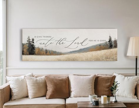 Bring the beauty of faith and the warmth of fall into your home with our "O Give Thanks To The Lord For He is Good" Christian Wall Art, featuring Psalm 118:1. This stunning landscape canvas wrap captures the essence of autumn with neutral creamy tones and deep earth hues, making it the perfect piece for your seasonal home décor. The elegant script of the scripture, "O give thanks unto the Lord; for he is good" (Psalm 118:1, KJV), serves as a heartfelt reminder of God's enduring goodness and merc Christian Housewarming Gift, Psalm 118 1, Church Interior Design, Give Thanks To The Lord, Psalm 118, Farmhouse Wood Sign, Scripture Wall Art, Hanging Canvas, Seasonal Home Decor