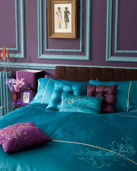 This may be one of my favorite designs on the list. The bed is covered with a gorgeous silk comforter with embroidered flower designs on it. The teal and purple pillows also have some stitch work done and some crystal accents sewn onto them. Behind the bed is a beautiful purple wall with teal trim work all around it. This is definitely something that can be easily recreated for a stunning new look in your home. Peacock Bedroom, Blank Frames, Peacock Room, Teal Curtains, Teal Trim, Moroccan Colors, Turquoise Room, Bedroom Turquoise, Teal Bedroom