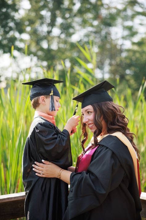 Mother and son wearing graduation gowns Mom Son Graduation Photos, Mother And Son Graduation Pictures, Senior And Kindergarten Pictures, Graduation With Parents, Mother Son Graduation Pictures, Graduation Photoshoot Ideas With Family, Nursing Graduation Pictures With Kids, College Graduation Pictures With Kids, Mom And Son Graduation Photo Ideas