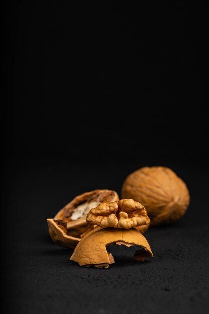 Walnut on a dark background | Premium Photo #Freepik #photo #walnut #dried-fruit #black-seed #nuts Walnut Photography, Health Benefits Of Walnuts, Nutter Butter Cookies, Nutter Butter, Nut Recipes, Food Ads, Xmas Card, Black Seed, Dark Background