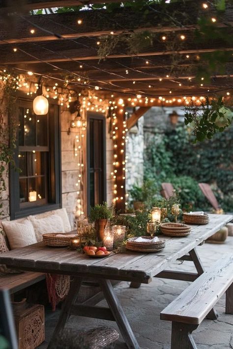 "Create a warm and welcoming atmosphere with a Rustic Outdoor Dining Area! 🍽️🌾 Perfect for enjoying meals under the stars. 🌟✨ #OutdoorLiving #RusticDining #GardenDesign" Screened Porch Dining Area, Front Porch Dining Ideas, Rustic Back Porch, Rustic Outdoor Dining, Landscaping Front Porch, Outdoor Corner Bench, Front Porch Lights, Decorate Front Porch, Decoration Front Porch