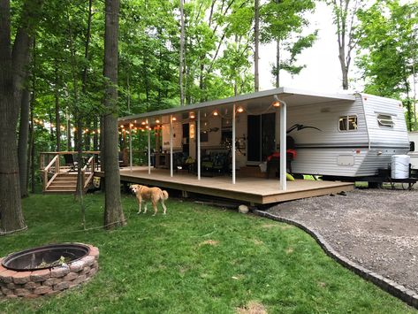 Rv Front Porch Ideas, Rv Porches And Decks, Camper Outdoor Set Up, Trailer Deck Ideas, Permanent Campsite Ideas, Permanent Camper Site Ideas, Camper Deck, Porch For Camper, Campsite Decorating