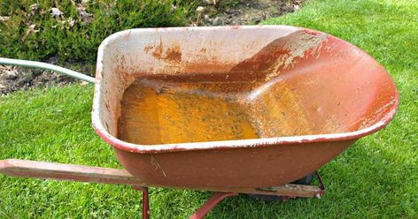 How to Make a DIY Wheelbarrow Planter Wheel Barrel Planter, Diy Wheelbarrow, Wheelbarrow Decor, Making Raised Garden Beds, Wheelbarrow Planter, Wheelbarrow Garden, Cottage Decor Living Room, Drought Resistant Plants, Vegetable Garden Raised Beds