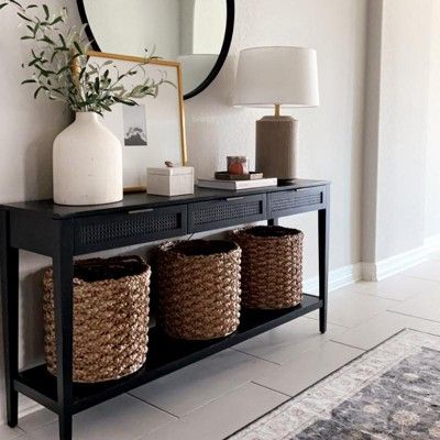 Woven Drawer Console Table, Black Metal Entryway Table, Black Console Table Entryway Decor, Black Hall Console Table, Entry Way Table Black, Black Console With Baskets, Woven Console Table, Entryway Ideas Black Table, East Bluff Woven Drawer Console