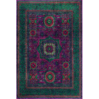 To complete your home decor, add warmth and elegance to your space with our elegant and unique printed rugs. Bungalow Rose Rug Size: Rectangle 5'10" x 9'2" | Bungalow Rose Mushkan Area Rug green/indigo 110.0 x 70.0 x 0.1 in, Polyester | C111045608_164064622 | Wayfair Canada Green And Purple Furniture, Jewel Tone Area Rug, Bold Area Rugs, Green And Purple Rug, Purple And Green Rug, 70s Area Rug, Jewel Toned Decor, Whimsigoth Rug, Ethereal Home Decor