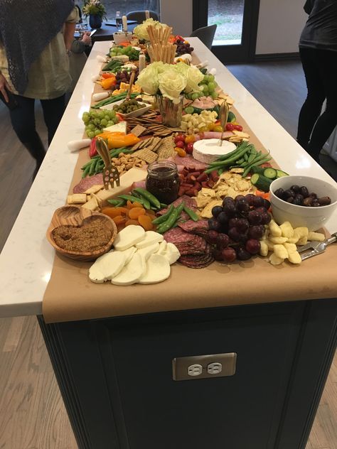 Butcher paper down the kitchen Island makes a fantastic cheeseboard Island Cheese Board, Charcuterie Spread Kitchen Island, Grazing Table Kitchen Island, Food Set Up On Kitchen Island, Island Grazing Table, Butcher Paper Buffet Table, Charcuterie Kitchen Island, Grazing Table On Kitchen Island, Charcuterie Board Kitchen Island