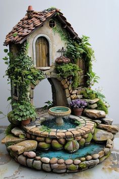 https://pin.it/2suyM1d5y Diy Art Room, Outdoor Fountain Ideas, Waterfall Home, 3d Tiskárna, Pondless Waterfall, Tiny Garden Ideas, Fairy Garden Pots, Homemade Bird Houses, Fairy House Crafts