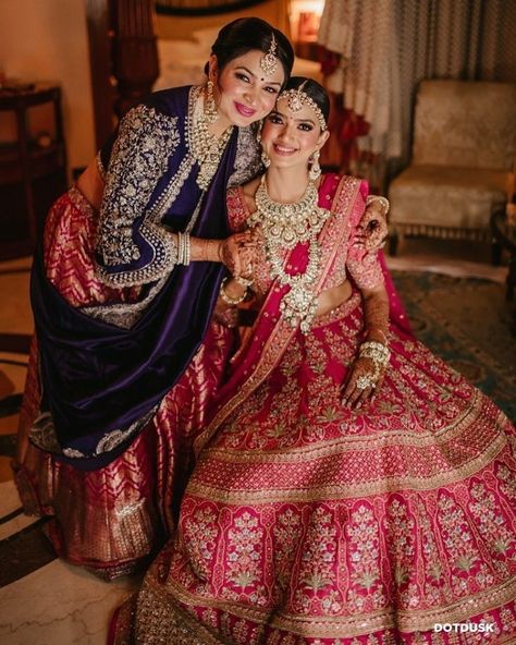 We are crushing over these Bride & Mother Color Coordinating Outfits for Weddings.Coordinating in Pink Lehengas or coordianting in same sarees, this outfits are must seen. #shaadisaga #indianwedding #colorcoordinatingoutfits #brideandmothercolorcoordinatinglehenga #daughterandmothercoordinatedoutfits #daughterandmothercolorcoordinatedoutfits #brideandmotherpictures #brideandmotherpicturesindian #brideandmotherphotos #brideandmotherindian #brideandmotherpicturephotoideas #brideandmotherphotoshoot Colour Coordinated Outfits, Mother Daughter Wedding Photos, Outfits For Wedding, Mother Daughter Poses, Mother Daughter Wedding, Mother Of The Bride Looks, Flushed Cheeks, Coordinated Outfits, Coordinates Outfits