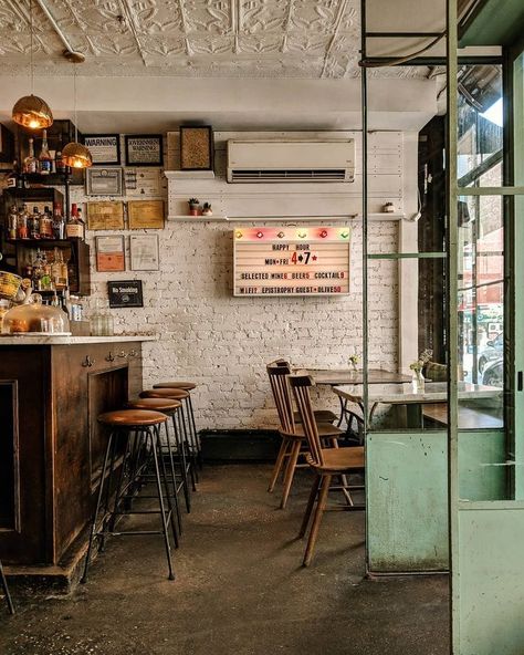 Rustic industrial cafe interiors with wooden accessories and metalwork New York Cafe Interior, Coffee House Interior Design, Small Cafe Ideas, Small Food Shop, Cafe Interior Design Small, New York Cafe, Little Coffee Shop, Coffee Shop Coffee, Corporate Ladder