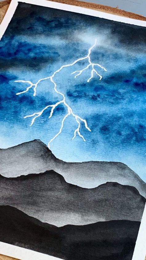 Learn how to paint a very simple landscape with a lightning storm using watercolours. This is very easy to pain, perfect for beginners. Storm Drawing Simple, Watercolor Art Easy Landscape, Weather Painting Art, Thunderstorm Painting Easy, Simple Water Paintings For Beginners, Landscape Drawings Watercolour, Lightning Painting Ideas, Watercolor Drawing Easy Simple, Water Colouring Ideas