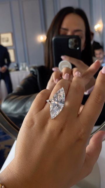 CHAMPAGNE GEM®️ by Bebe on Instagram: "the grand beauty of marquise! an alluring 23-carat D VS1 type IIa marquise-cut diamond solitaire ring with delicate diamond encrusted details through the basket and band, seen few month ago at @christiesjewels magnificent jewels which sold for over $1 million. <> #MyLoveAffairWithDiamonds #MagnifiqueMarquise #Fire #MarquiseCut #Brilliance #Scintillation #Sparkle #Bridal #EngagementRing #HighJewelry #Christies #ChristiesJewels #ChampagneGemGoesToGeneva #Cham Treasure Hoard, 2025 Bride, Dream Wedding Ring, Magnificent Jewels, Marquise Cut Engagement Ring, High Jewelry Ring, Expensive Jewelry Luxury, Engagement Rings Marquise, Diamond Solitaire Ring