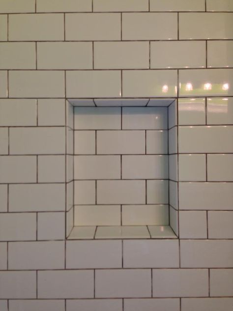 Nicely squared niche. Maybe a different color of tile for the interior for a pop? Subway Tile Shower Niche, Tile Shower Niche, Bathroom Niche, Recessed Shelves, Small Shower Remodel, Shower Recess, Subway Tile Showers, Shower Inserts, Shower Storage