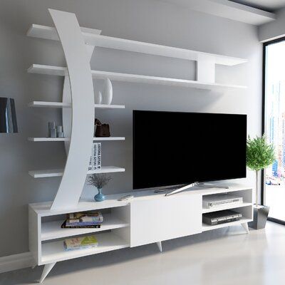 Transform your living space with the modern and stylish TV unitIntroducing our stunning TV unit that will revolutionize the way you enjoy your favourite shows and movies. With its sleek design and solid colour concept, this unit will instantly elevate the style of your living space. Unmatched Quality and DurabilityCrafted from 100% melamine-coated particle board, this TV unit is built to last. The 18mm thickness ensures exceptional strength and stability, making it a reliable addition to your ho Tv Wall Panel, Home Tv Stand, Floating Entertainment Center, Living Tv, Tv Home, Faux Leather Dining Chairs, Organized Living, Tv Sideboard, Tv Wall Design