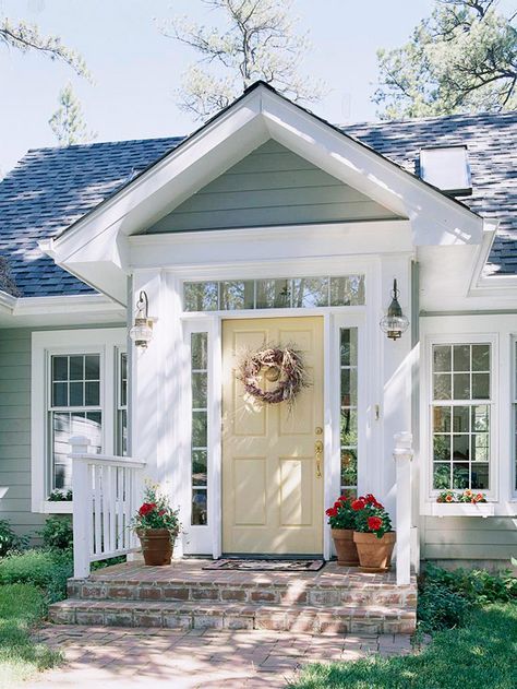 We love this pale yellow door! 19 more ways to improve your curb appeal: http://www.bhg.com/home-improvement/exteriors/curb-appeal/ways-to-add-curb-appeal/?socsrc=bhgpin071712yellowfrontdoor#page=3 Front Porch Design Ideas, Front Porch Remodel, Veranda Design, Front Door Inspiration, Porch Design Ideas, Porch Remodel, Yellow Door, Front Porch Design, Cottage Style Home