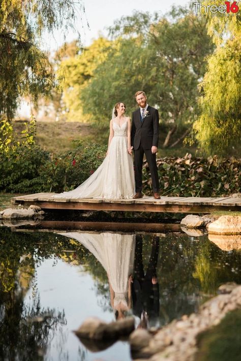 Galway Downs by Wedgewood Weddings is a San Diego-area all-inclusive wedding venue located in Temecula, California | bride + groom overlooking pond Galway Downs Wedding, Wedding By A Pond, Pond Wedding Ideas, Wedding By Pond, Pond Wedding Ceremony, Pond Wedding Photos, Lake Wedding Pictures, Newfoundland Wedding, Wedding Landscape