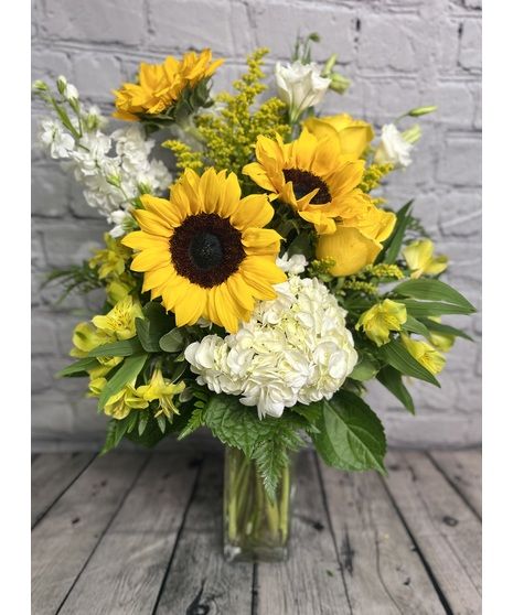 Want to send to send a whole lot of sunshine to someone who's on your mind today? This happy bouquet really delivers! Gorgeous sunflowers, hydrangea, and more make up this singularly spectacular gift! Sunflower Arrangement Ideas, Floral Arrangements With Sunflowers, Sunflower And White Rose Bouquet, Sunflower Wedding Centerpieces, Sunflower Floral Arrangements, Sunflower Arrangements, White Rose Bouquet, Bloom Where Youre Planted, Flower Arrangement Designs