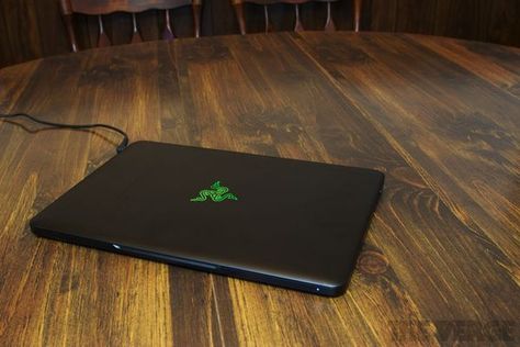 Razer Blade review (14-inch) - The Verge Razer Laptop, Razer Blade, Architecture Ideas, Cupboard Design, Green Logo, Racing Stripes, The Verge, Retina Display, Gaming Laptops