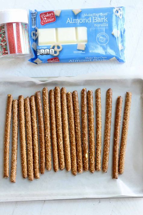 Almond Bark Pretzel Rods, Candy Coated Pretzel Rods, White Chocolate Dipped Pretzel Rods, Frosted Pretzel Sticks, How To Make Pretzel Rods Dipped, Candy Coated Pretzels, How To Dip Pretzel Rods, Dipped Pretzel Rods How To Make, Pretzel Rods Dipped Recipe